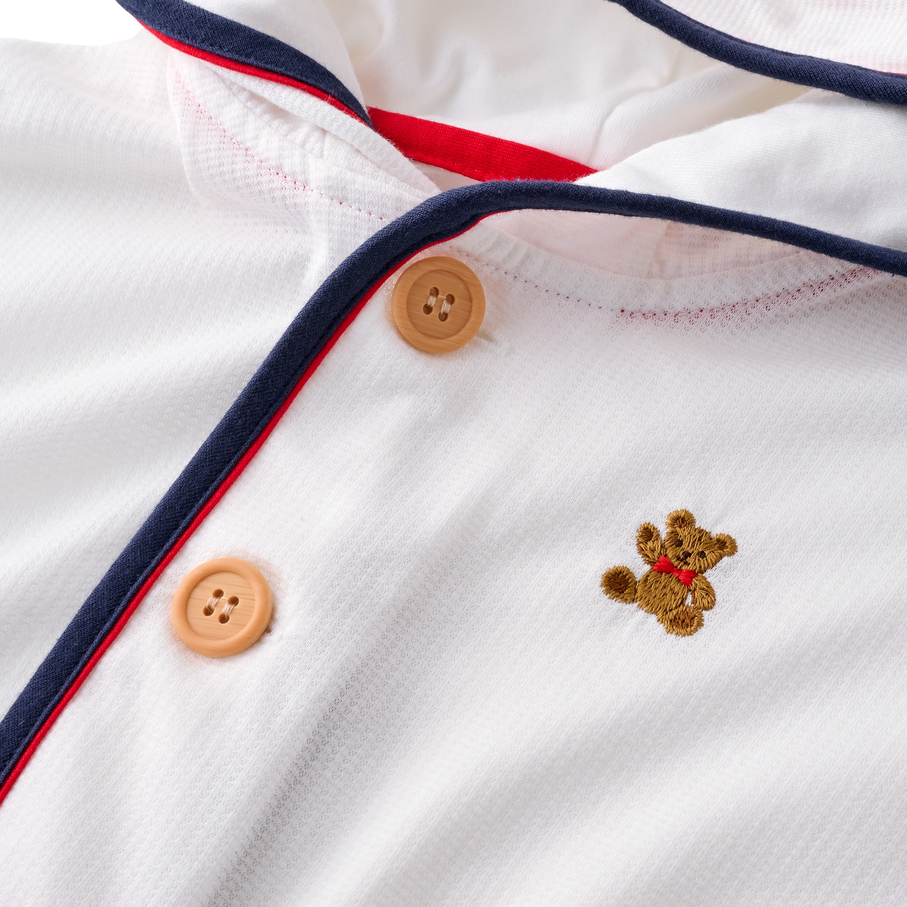 ミキハウス おでかけポンチョ - くまの刺繍ディテール